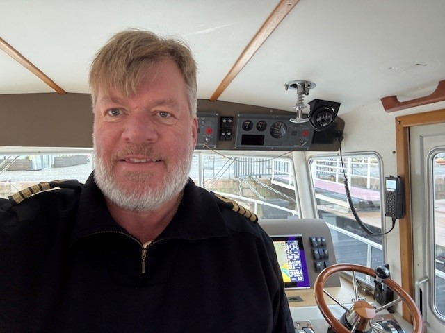 Captain Mikael at the helm